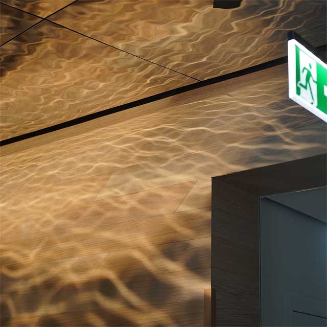Germany, Frankfurt, Residence Tower Axis, Side Corridors On The Entrance Floor, Ceiling System Schumann, Surface EXYD-M Generates Light Patterns (Caustics), Photo EXYD
