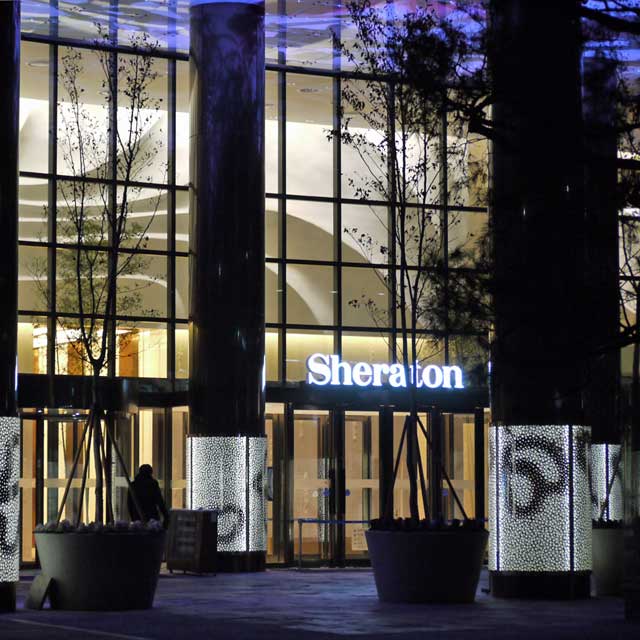 South Korea, Seoul, D-Cube City, Entrance of the Five-Star Sheraton Hotel, Pattern Perforated and Back-Lit Column Wrappings, Photo EXYD